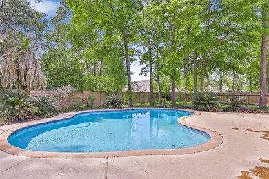 Pool only covers part of this spacious backyard