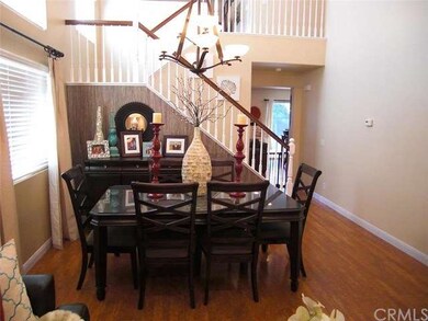 Great View of Dining Table, Stairs and beyond into