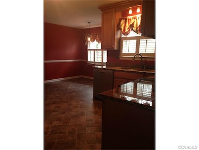 Kitchen with view of dining area.