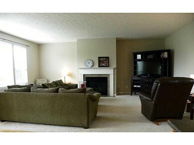Great Room. Extra large great room boasts romantic gas log fireplace.