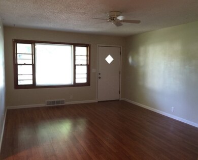 Living room with new Laminate flooring.