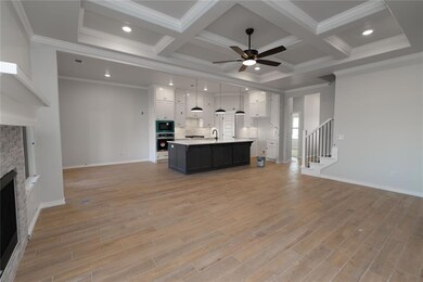 Unfurnished living room featuring light hardwood /