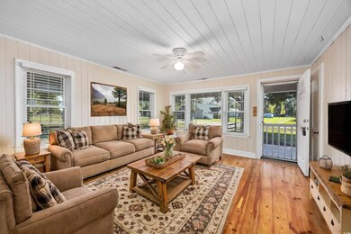 Area room featuring ornamental molding, wood ceili