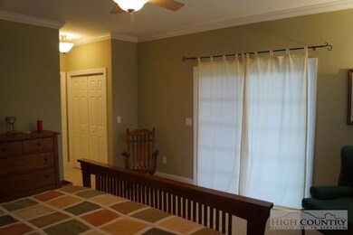 Master Bedroom: Sliding doors leading onto deck