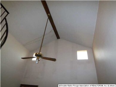 Ceiling in the den is very high.