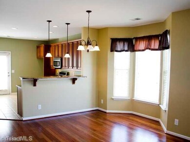 Dining Room. One of the advantages of an end unit is the natural light!  Nice bay window in the dining area.