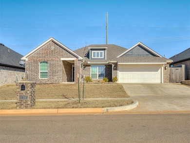 View of front of property with a garage