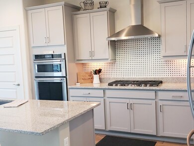 Walk in pantry built in upgraded appl.