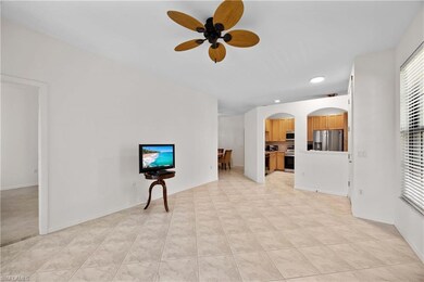 Unfurnished living room with light tile patterned 