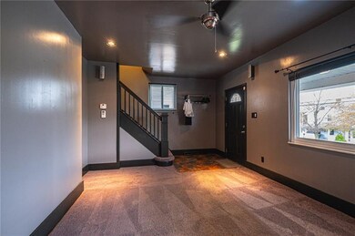 The reverse angle of the living room with ceiling 