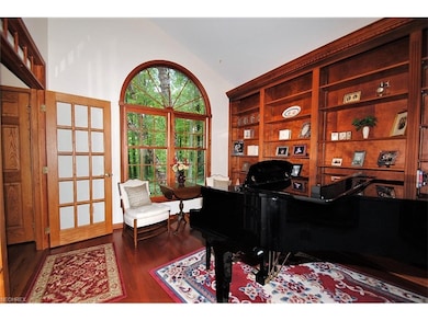 French doors open to library