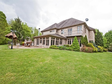The family room leads to the rear exterior paver p