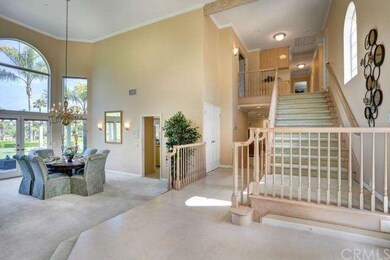 Entry and foyer with wide staircase to the master 