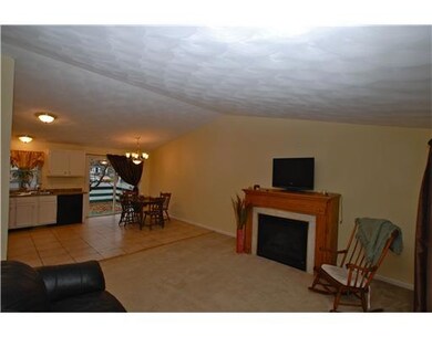 Living Room. The gas fireplace warms this space in