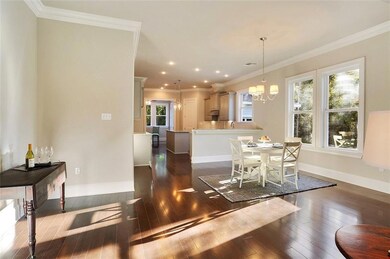 View from den into dining and kitchen area... perf