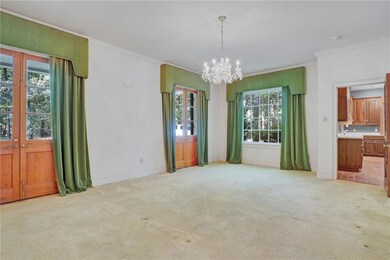 Formal dining with full sized working French doors