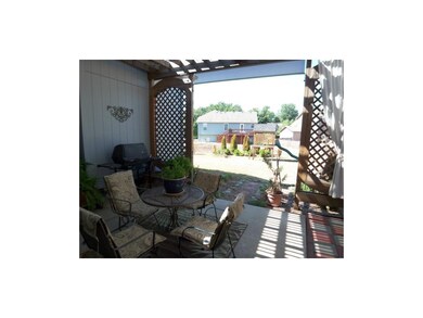 Lovely covered patio gives you a private outdoor s