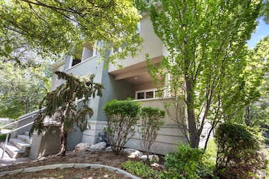 View of side of home with stucco siding