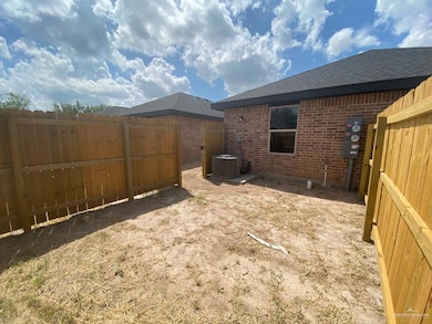 View of fenced backyard