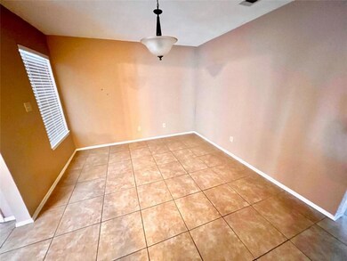 Unfurnished dining area featuring light tile patt