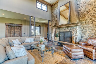 Floor to ceiling stone fireplace