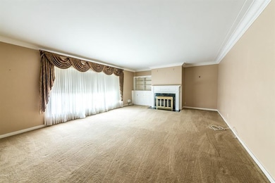 Gorgeous living room with gas fireplace, built in 