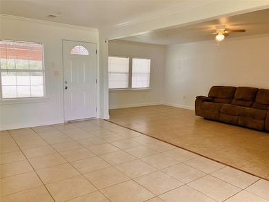 Main entry and living area to the right.