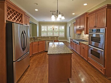 The kitchen is open and light and has a lovely bre