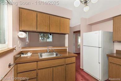 Kitchen with bar overlooking dining area