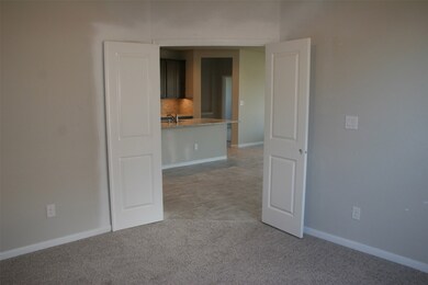From inside the study the view towards the kitchen.