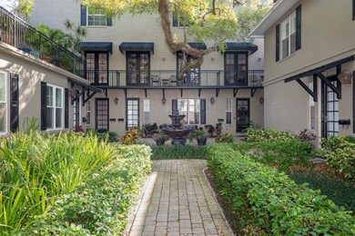 This charming central courtyard is complete with trickling fountain, wrought iron balconies and gas lanterns. A bit of New Orleans/French Quarter flair in the heart of South Tampa!