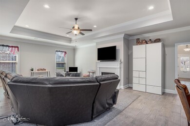 Living room featuring light wood-type flooring, a 