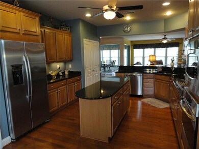 Grand Kitchen w/ceiling fan, can lighting, under cabinet lighting.