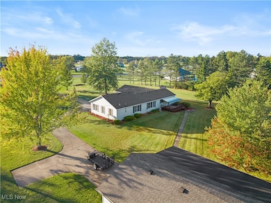 Aerial view of property and surrounding area