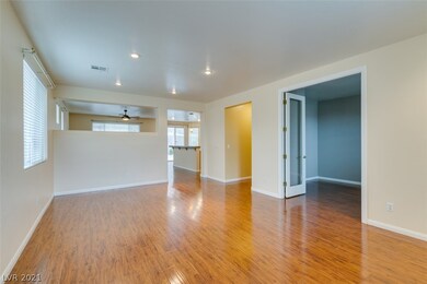 Laminate wood flooring throughout.