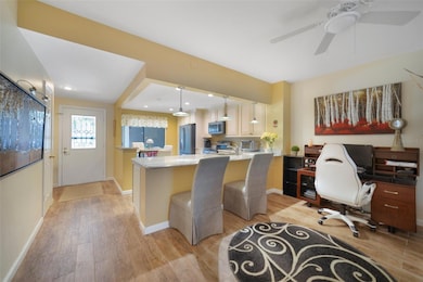 Breakfast Bar and Dining Area Currently Set up as Office