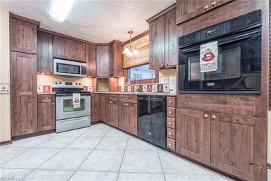 Note the built-in microwave and stove/range and bu