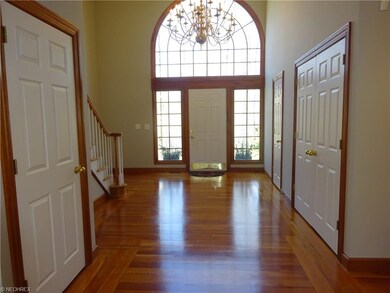 Grand Entryway: The guest bathroom is off this ent