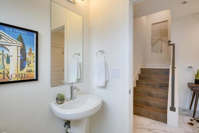 Half bath located on the first floor with the flex space.