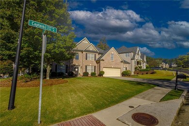 View of front of home with a front yard, driveway, and a residential view