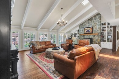 New wood floors, plantation shutters, stone veneer