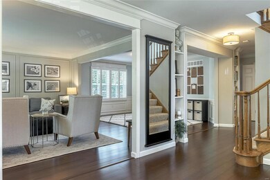A view of the living room off of the foyer.