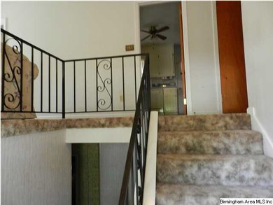 Split Foyer with Iron Ballisters