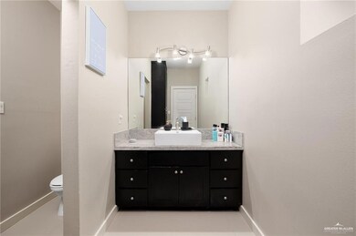 Bathroom with vanity and toilet