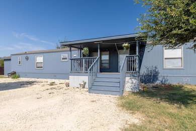Manufactured / mobile home with a porch and crawl space