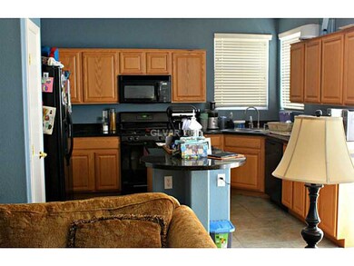 Kitchen. Kitchen which includes stove, refrigerato