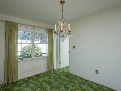 The dining room is conveniently...