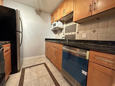 Totten Pond Village unit 25C, Waltham, MA 02451 - photo 3