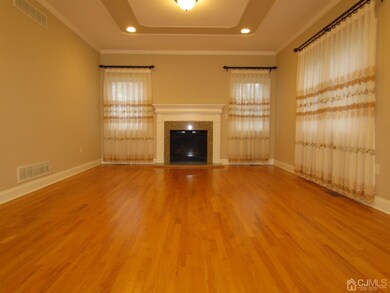 FAMILY ROOM WITH GAS FIREPLACE.