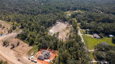 Aerial overview of property's location with a forest